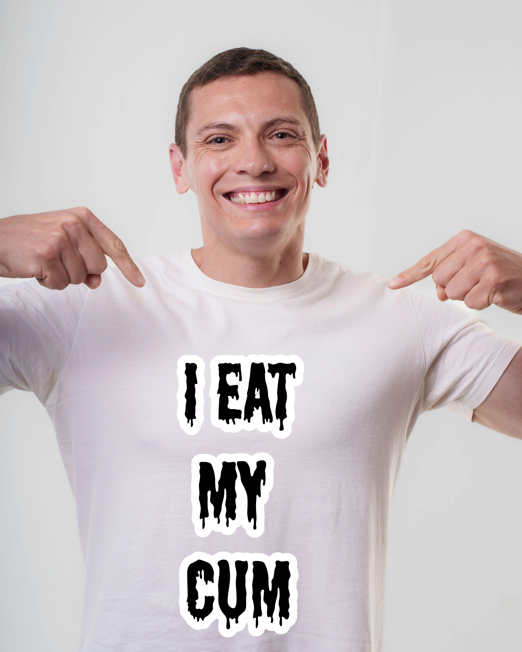 Cum Eating Mastery "Guy pointing to his shirt that says 'I Eat my Cum'"